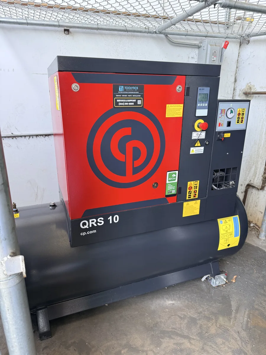 Chicago Pneumatic QRS 10 compressor installation with a Toolytics service label